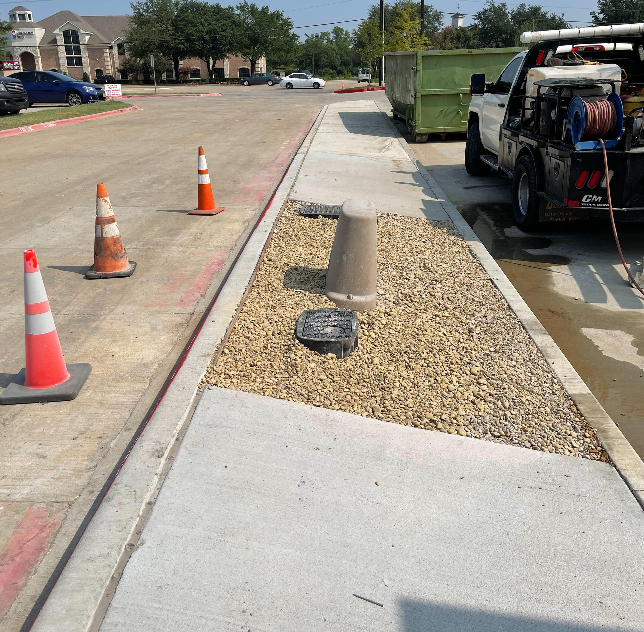 Hans de Jong Irrigation Company Residential sprinkler valve boxes installed in gravel in Texarkana, Texas. Expert irrigation system layout and protection for East Texas homeowners.