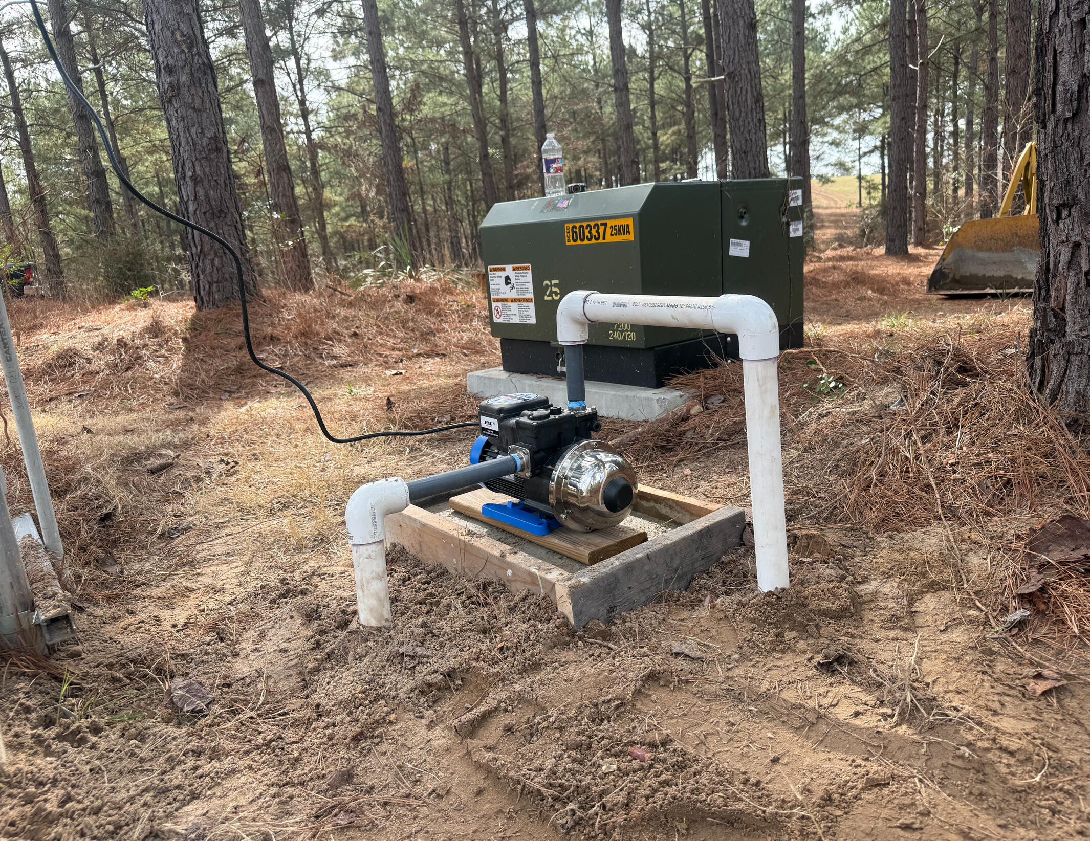 Hans de Jong Irrigation Company Above-ground water pump system installed near neighborhood utilities in Gladewater, Texas. Professional irrigation and pump solutions built for East Texas properties.